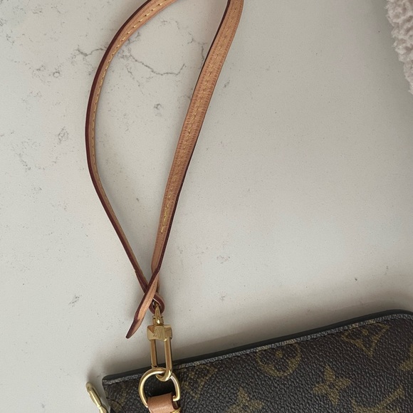 Authentic LV Neverfull pouch. Clean inside no rips or tears. Barely used. - Picture 7 of 7